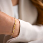 Brazaleta mujer bañado en oro nudo infinito